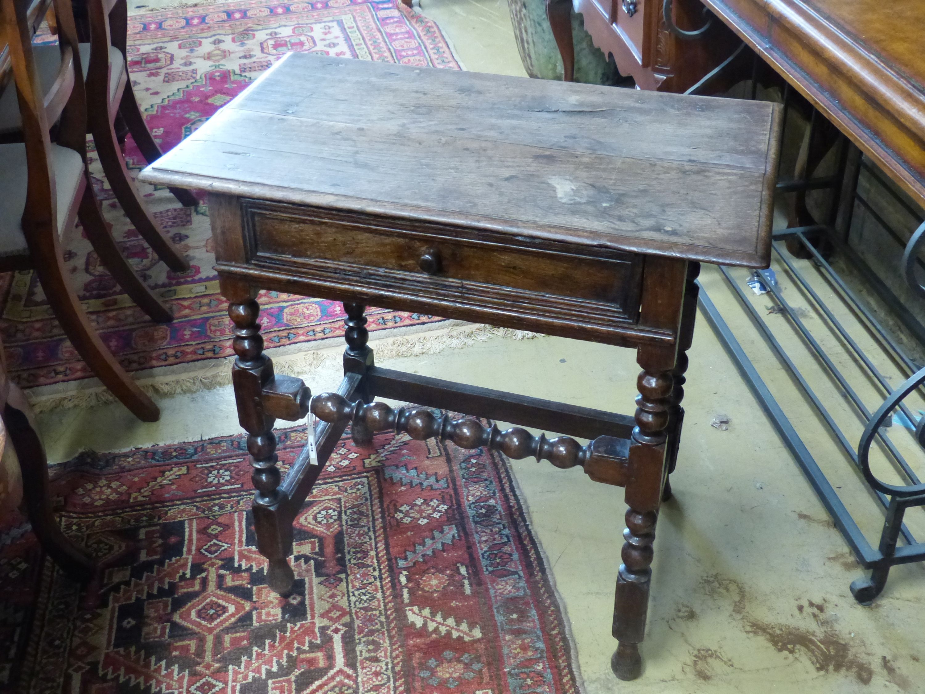 An oak side table, 18th century and later, width 76cm, depth 47cm, height 75cm